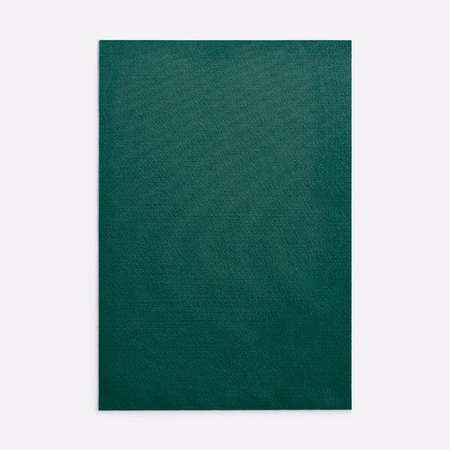 Deep forest-green finely woven curtain fabric with subtle tonal texture