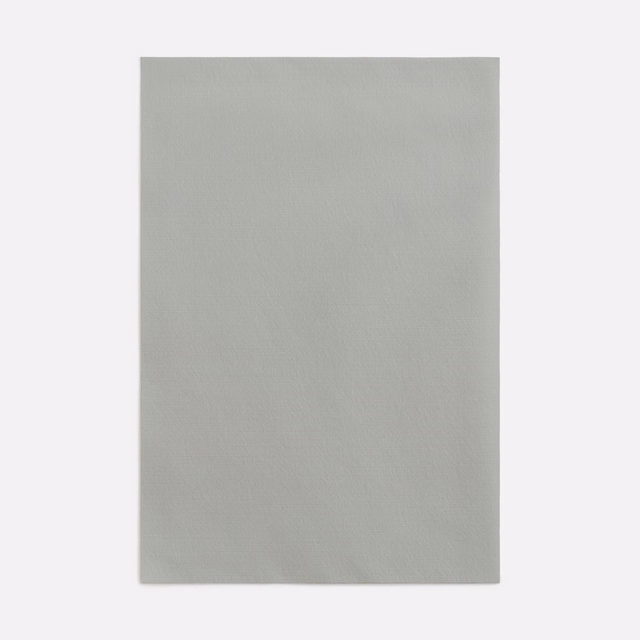 Cool mouse-grey plain weave with a softly mottled, low-contrast surface