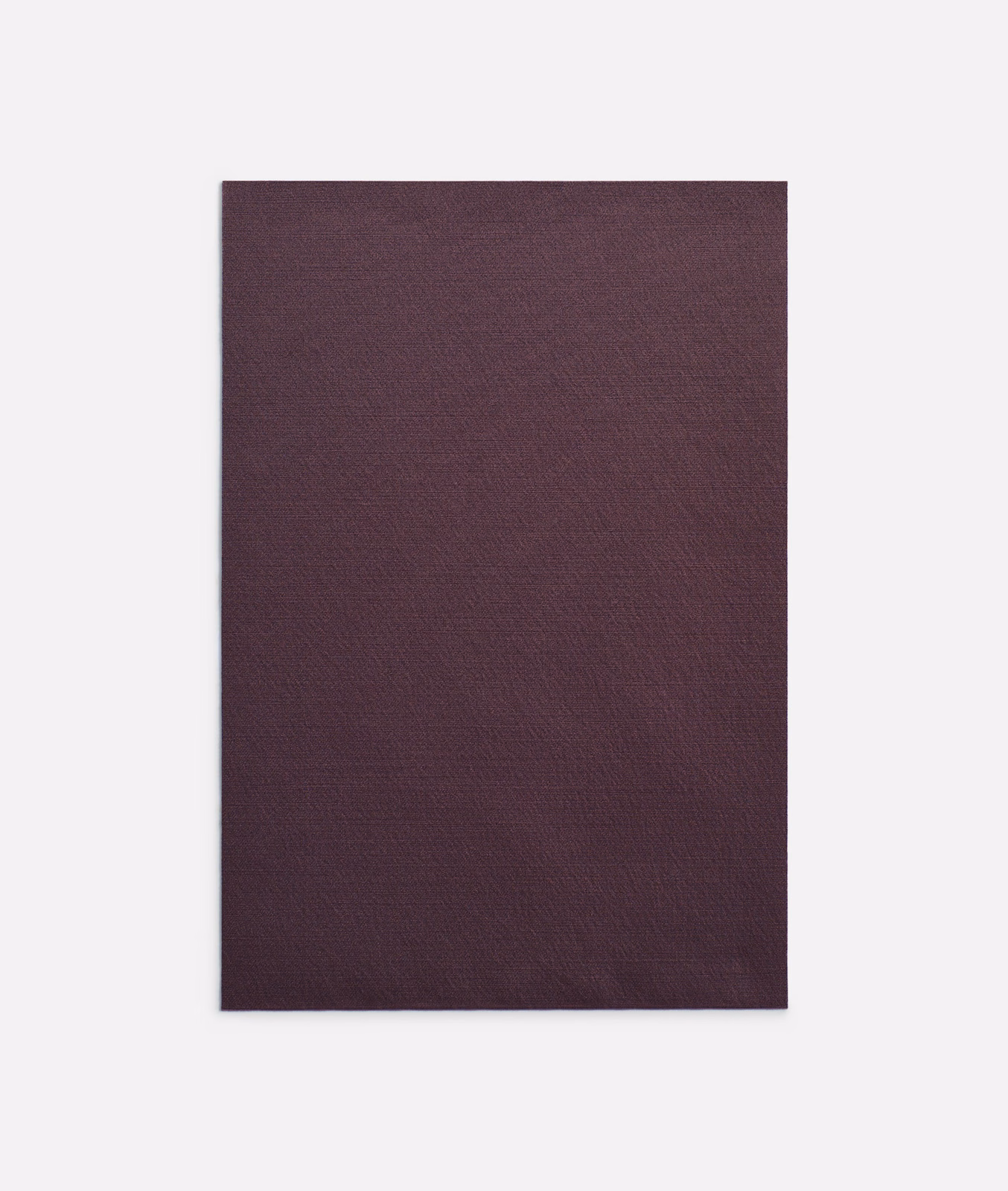 Deep plum-burgundy curtain fabric with a subtle, closely woven surface