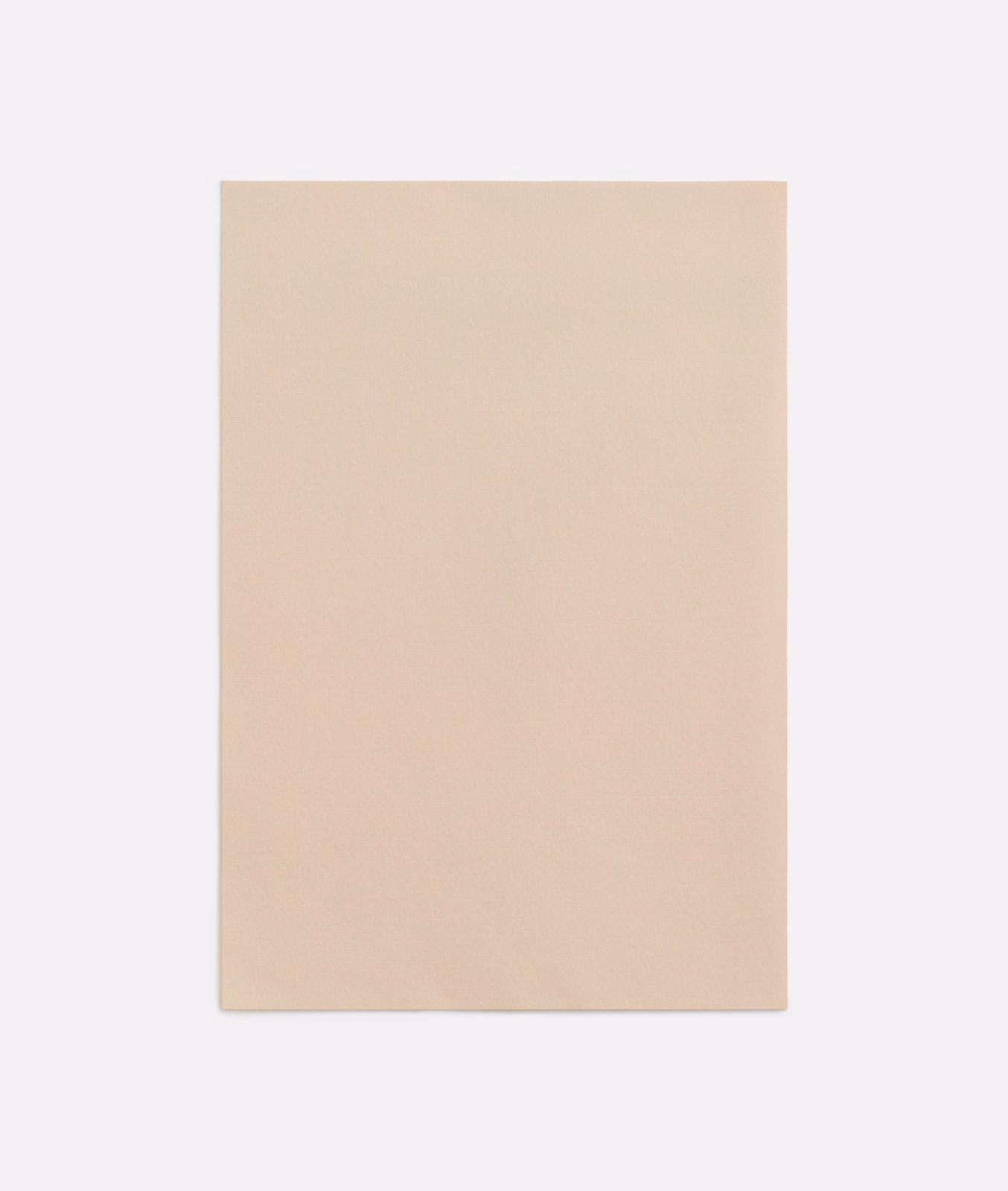Pale nude-beige plain textile with a barely visible fine surface texture