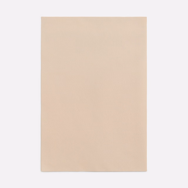 Pale nude-beige plain textile with a barely visible fine surface texture