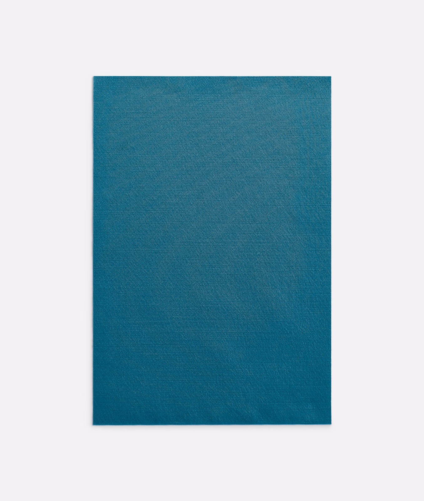 Deep blue-teal plain woven curtain fabric with subtle tonal texture