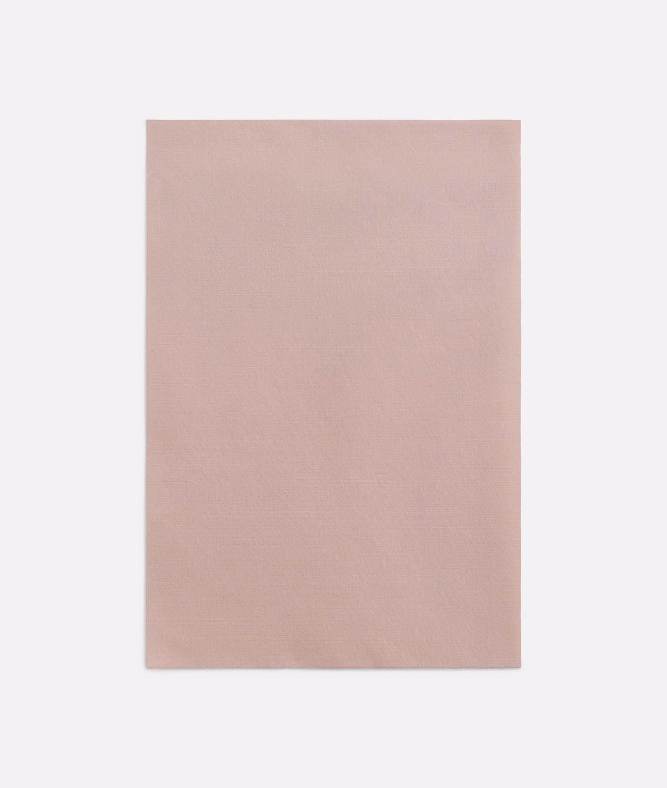 Plain dusty blush-pink curtain fabric with a fine, softly tonal surface