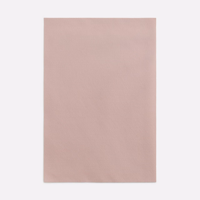 Plain dusty blush-pink curtain fabric with a fine, softly tonal surface