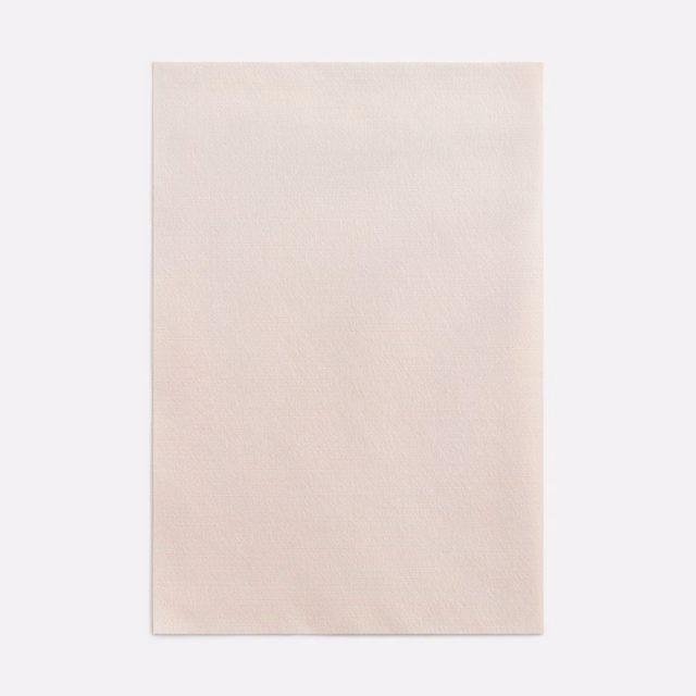 Pale blush-pink Razmir Petalo swatch with a fine, softly textured woven surface