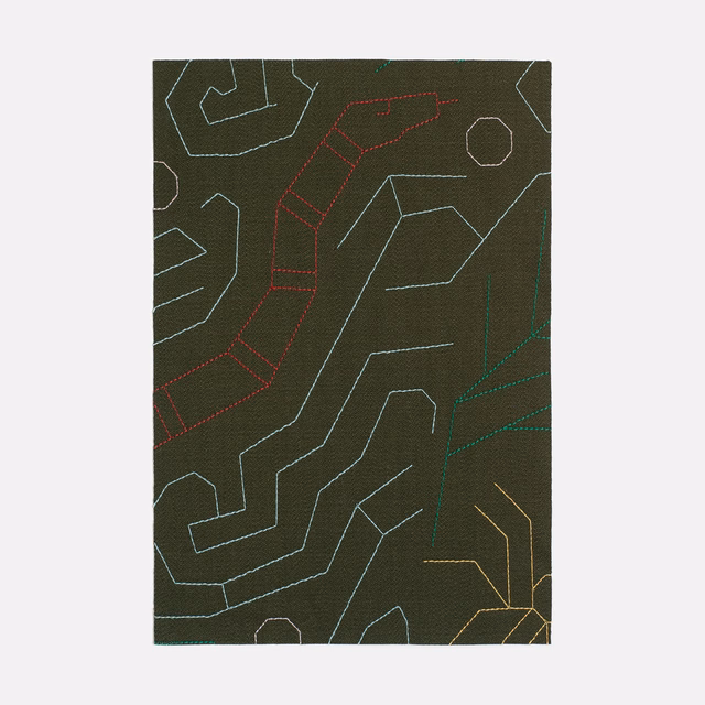 Dark olive woven ground with red, blue, green and ochre geometric outlines