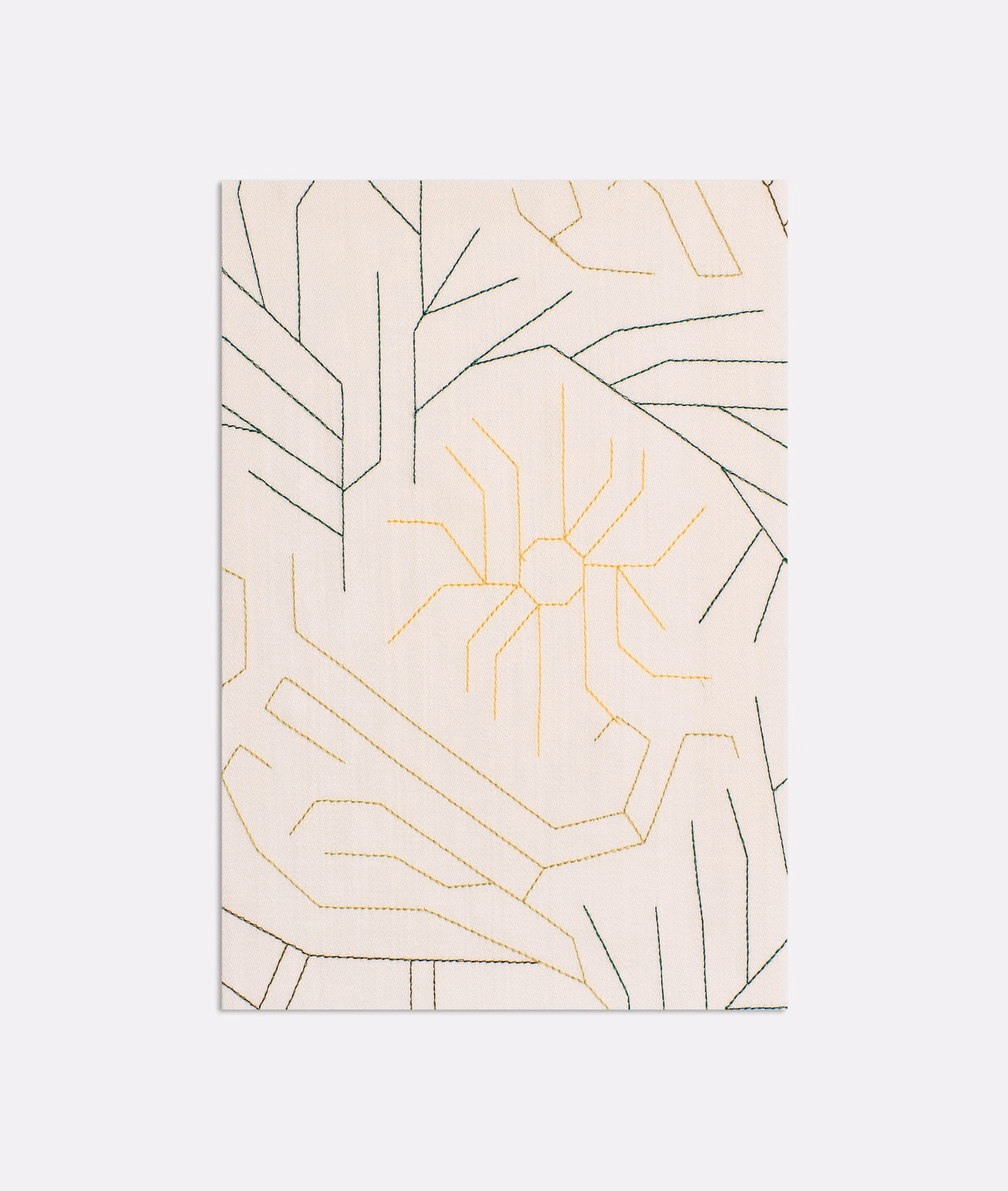 Warm ivory Dedar fabric with charcoal and pale-gold angular abstract linework