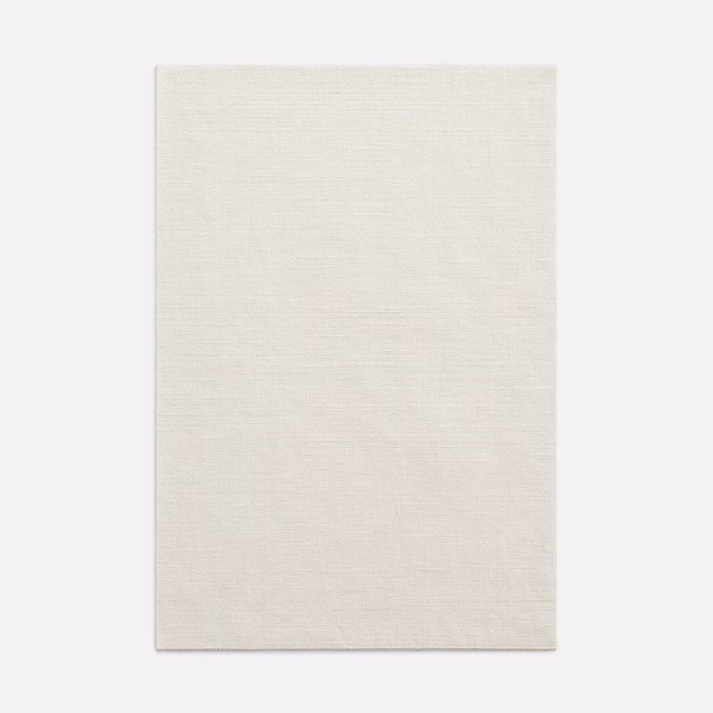 Pale ivory curtain fabric with a fine horizontal woven texture