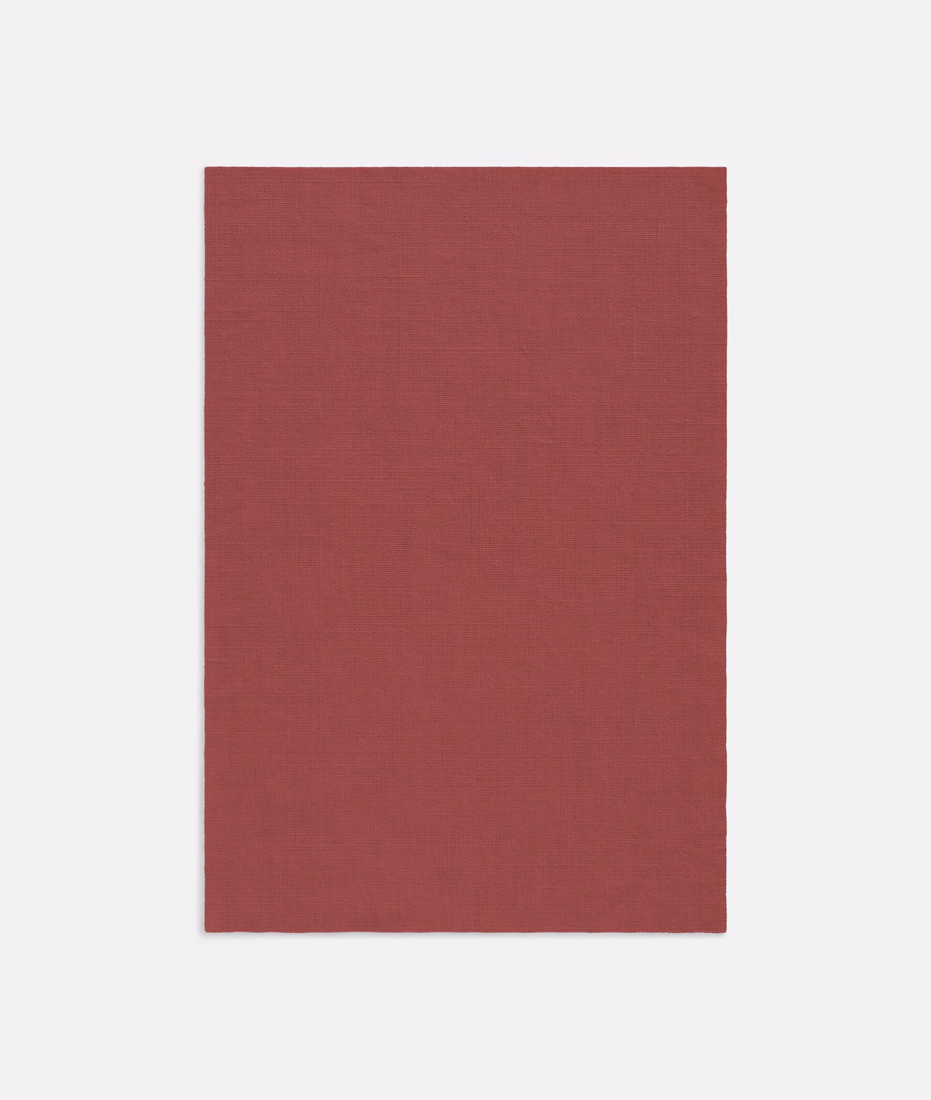 Muted Bordeaux red curtain fabric with a fine, subtly slubbed woven surface