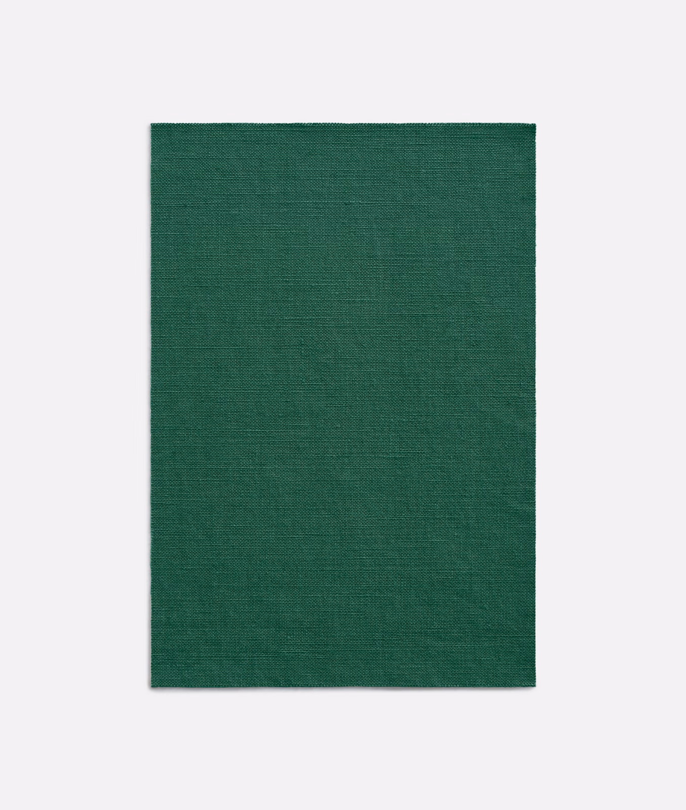Deep forest-green curtain fabric with a fine, subtly crosshatched woven texture