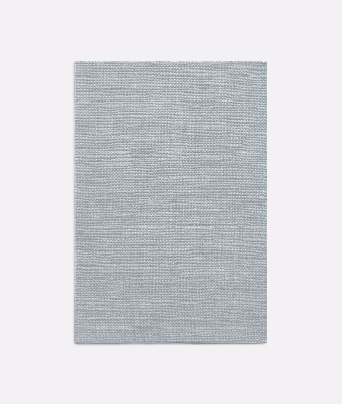 Pale blue-grey curtain fabric with a fine, subtly crosshatched woven texture