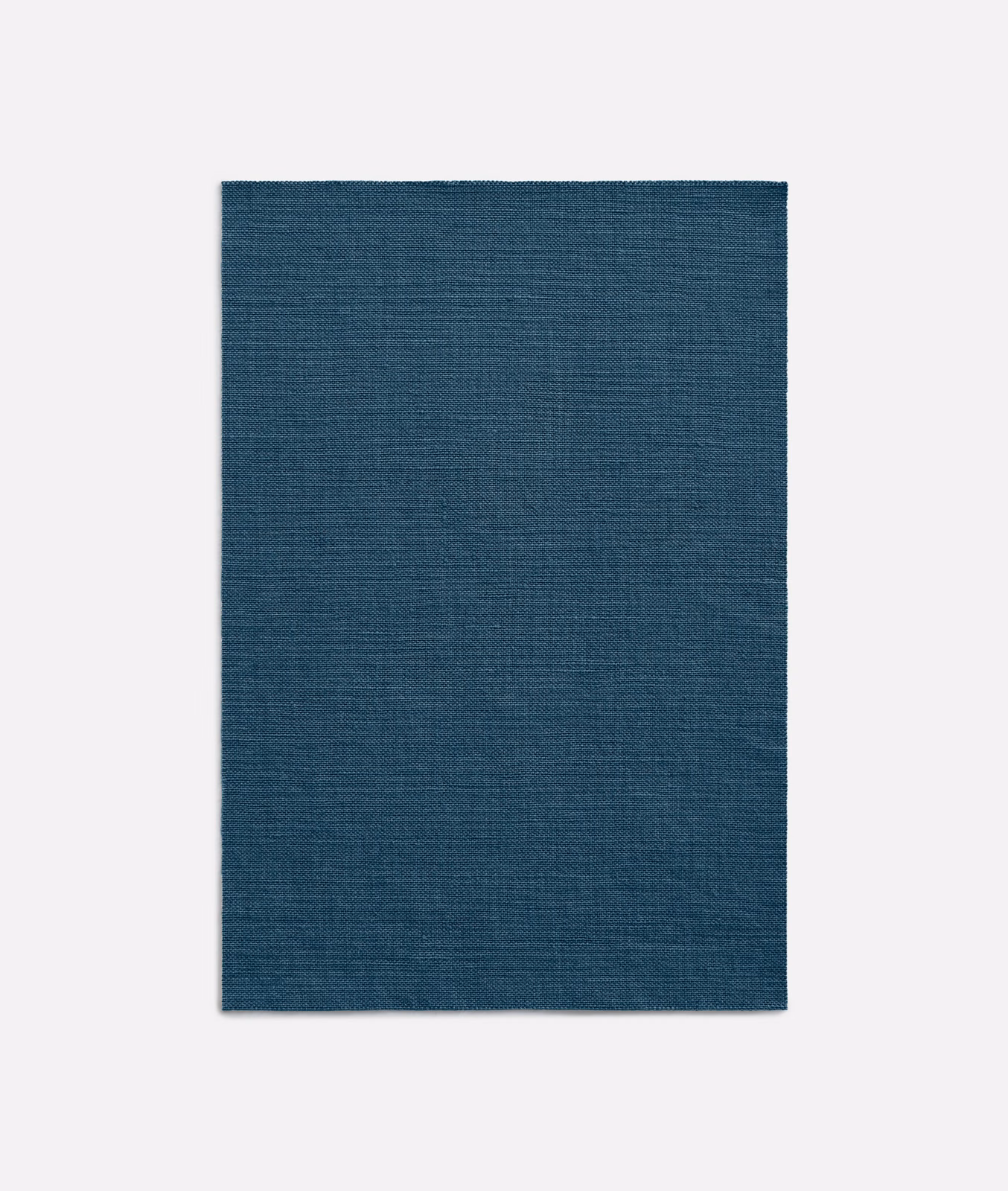 Deep navy-blue textile swatch with a subtle blue-green crosshatch weave