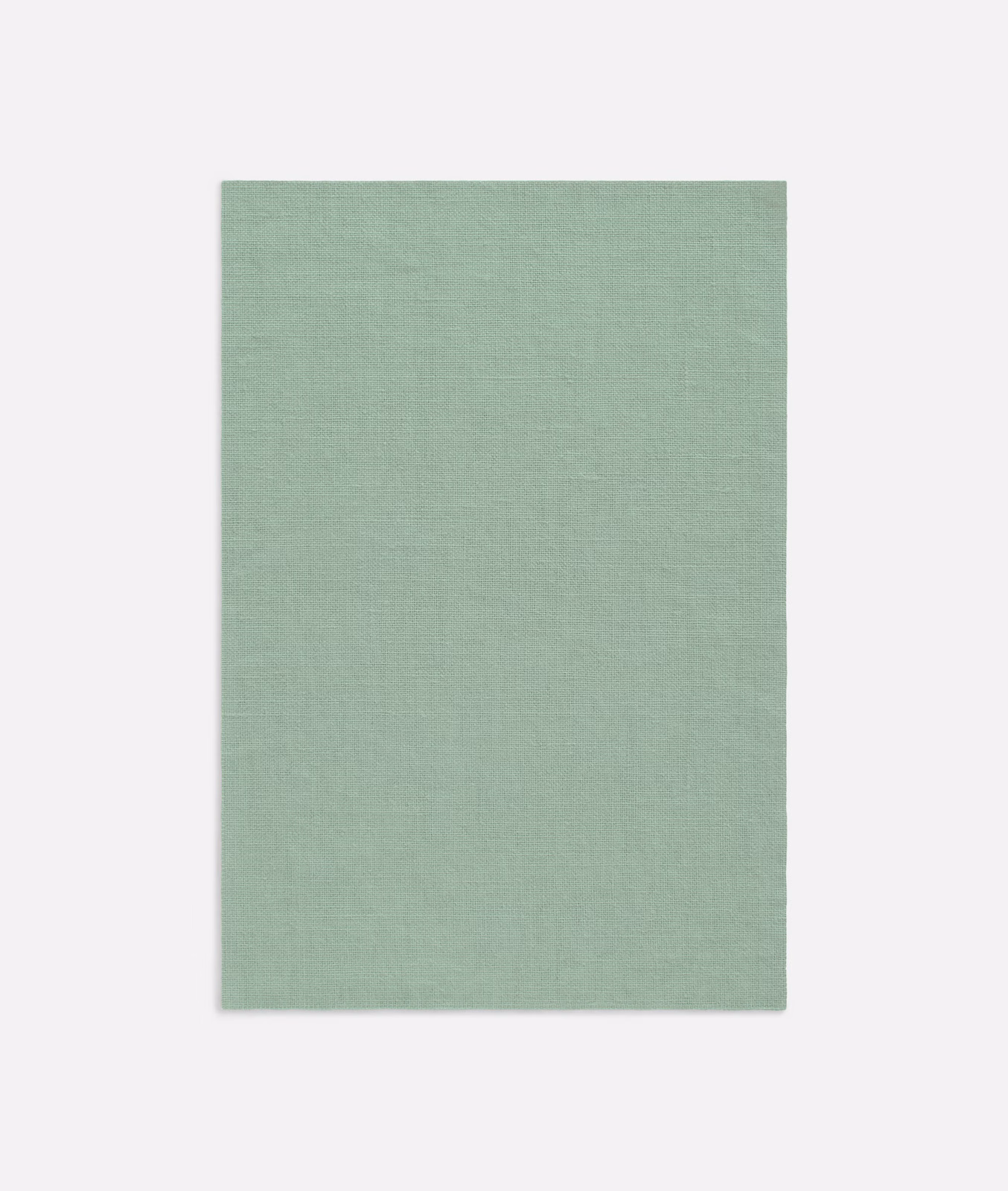 Pale sage-green Dedar curtain fabric with a fine, softly textured plain weave