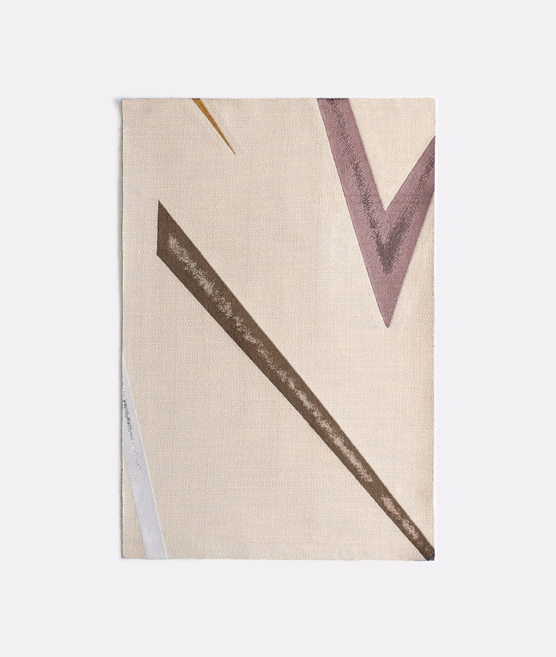 Warm ivory textile with mauve V, brown diagonal and ochre line