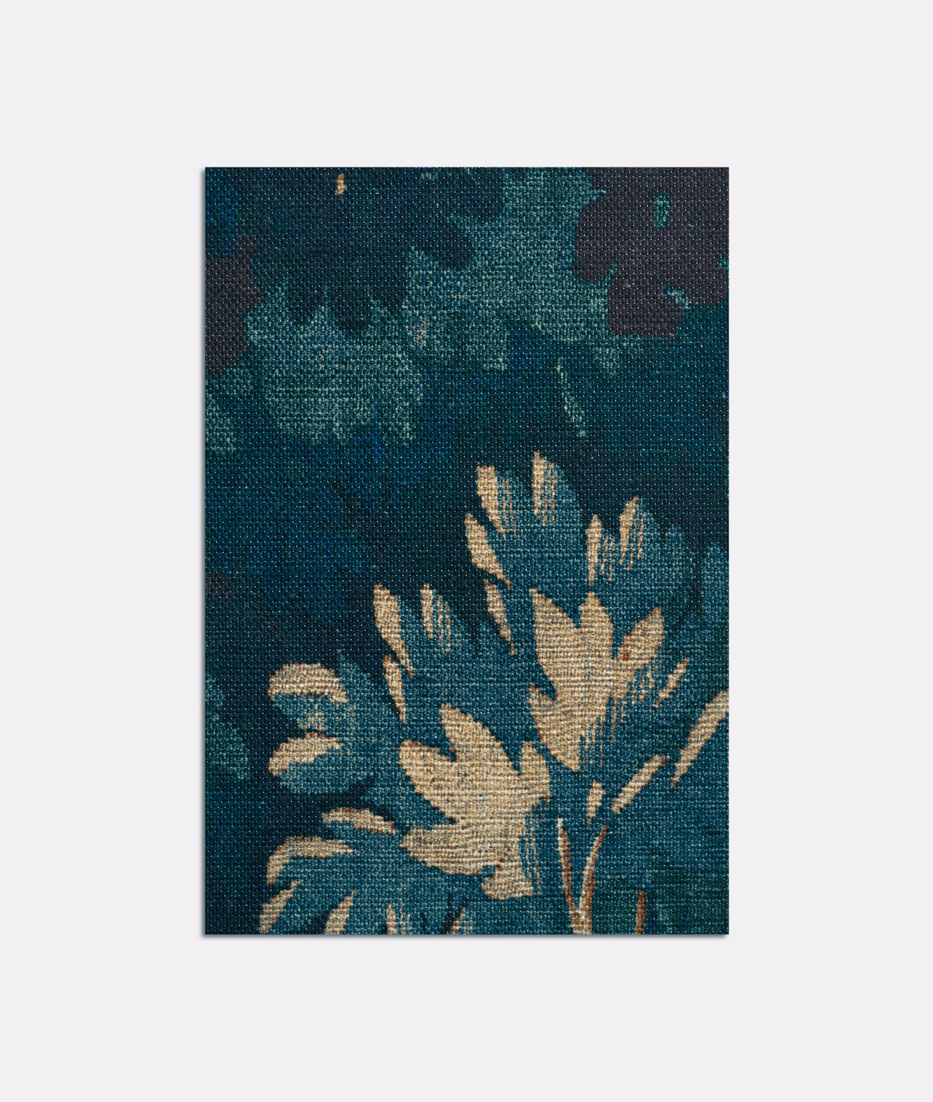Deep blue-teal woven ground with pale branching botanical leaves and shadowy floral depth