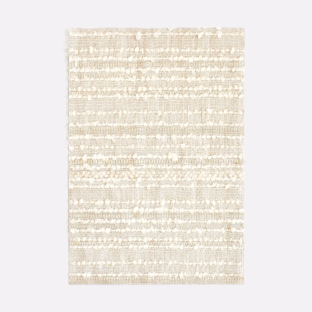 Warm ivory-beige woven swatch with irregular horizontal bands and subtle slubbed texture
