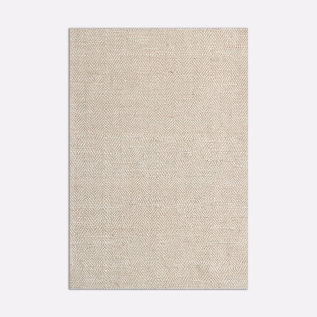 Warm ecru curtain fabric with a fine, subtly diagonal woven texture
