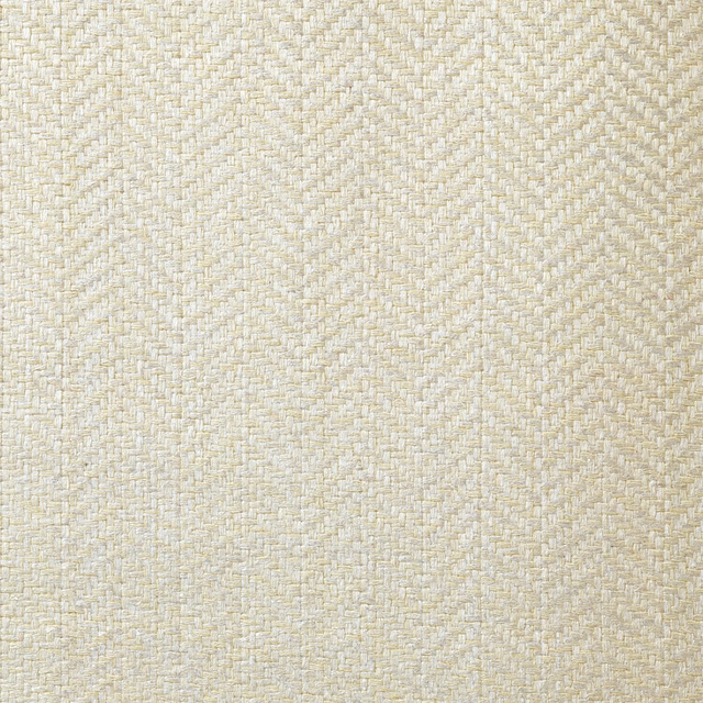 Close-up of warm ivory fabric with a fine, softly textured herringbone weave