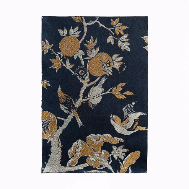 Dark navy jacquard with ochre birds, flowering branches and pomegranate-like motifs