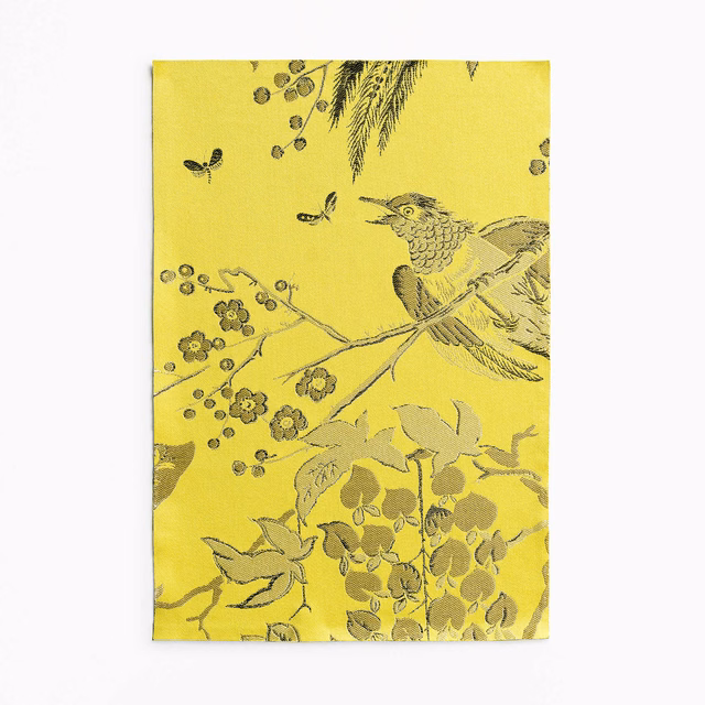 Acid lime jacquard with olive songbird, branches, butterflies and botanical motifs