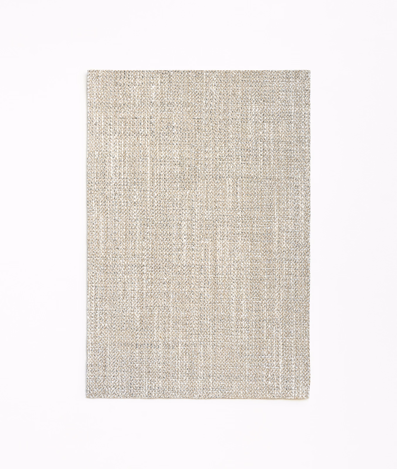 Pale greige woven curtain fabric with subtle vertical striations and flecked texture