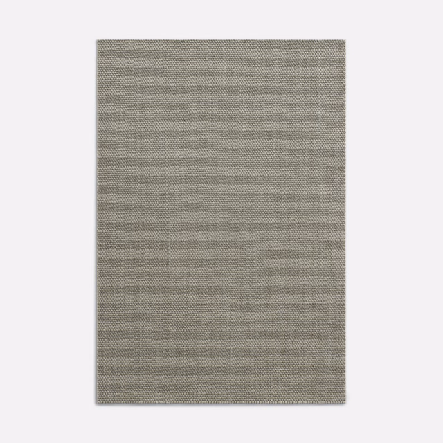 Close-up of grey-taupe woven fabric with fine texture and subtle vertical tonal variation
