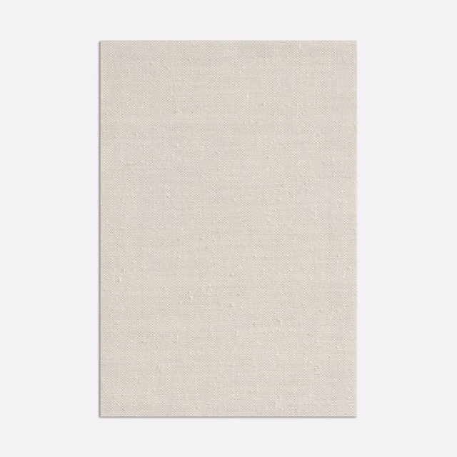 Pale warm-ivory curtain fabric with fine slubs and a softly textured weave
