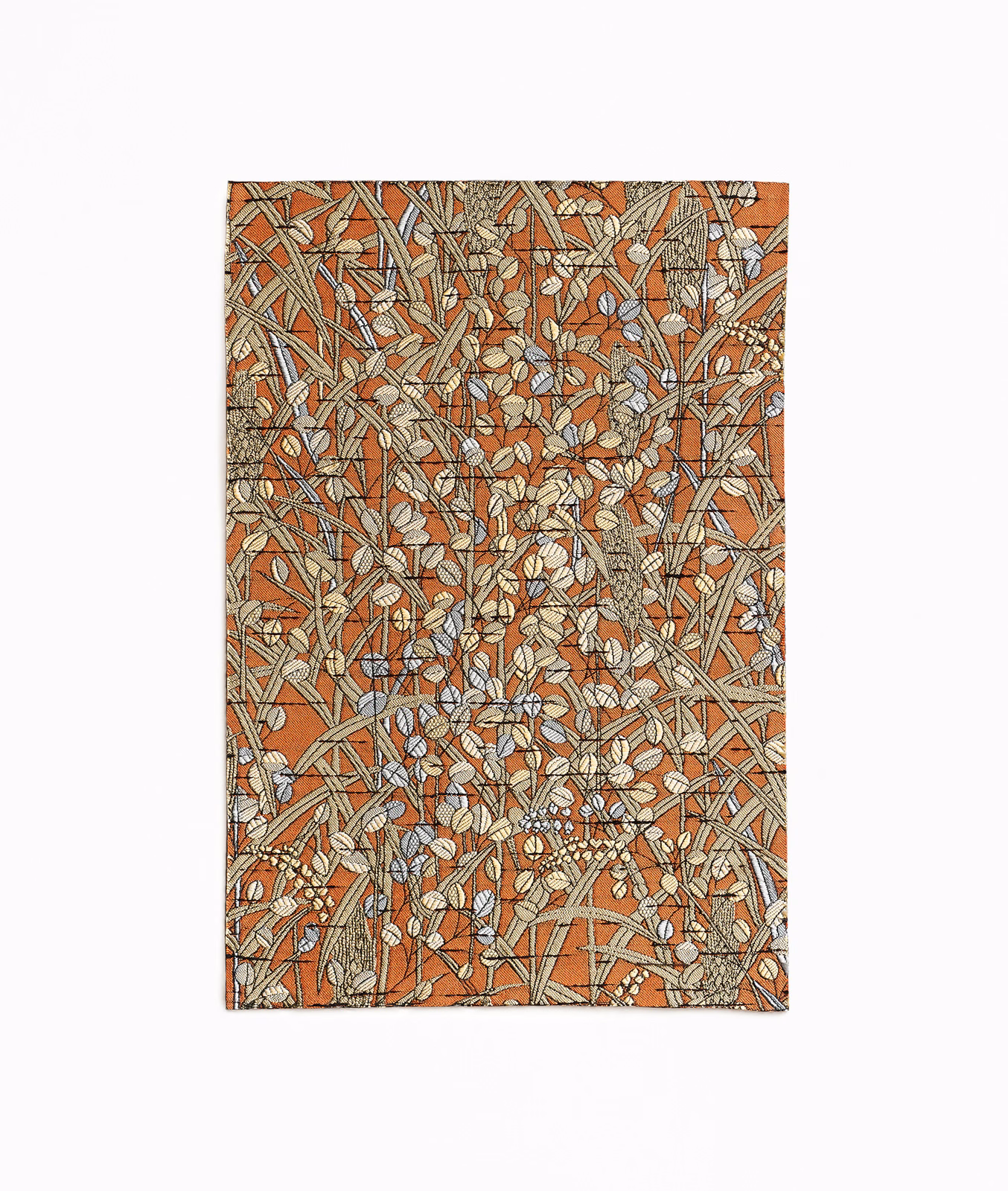 Muted terracotta curtain fabric with pale leaves and tangled fine botanical lines