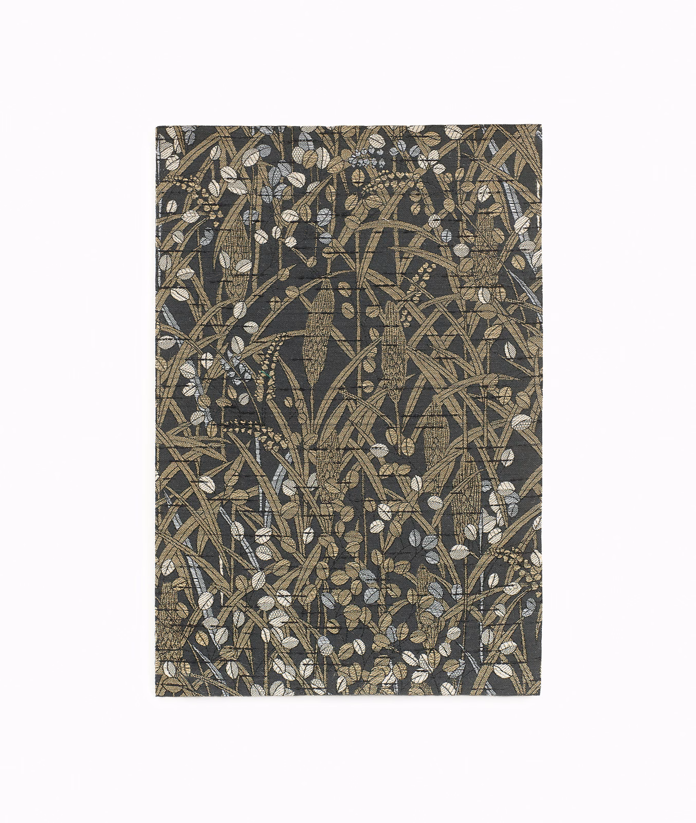 Charcoal-olive botanical textile with cream leaves, taupe stems and woven texture