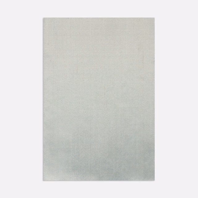 Pale celeste blue-grey cloth with a barely visible vertical woven texture