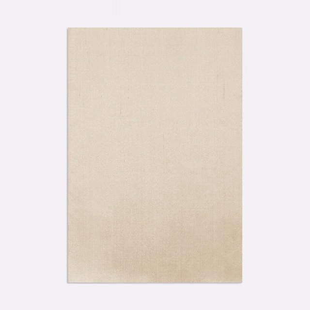 Warm latte ivory curtain fabric with a fine, subtly varied woven surface
