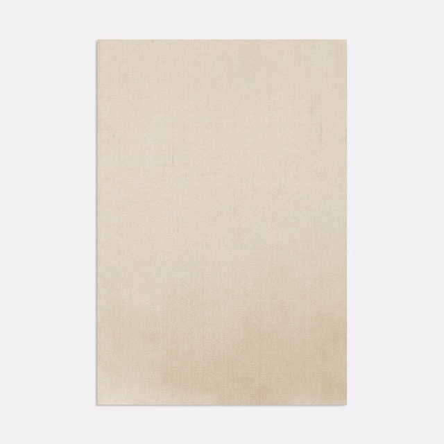 Pale nude-beige Dedar textile swatch with a fine, subtly textured plain surface