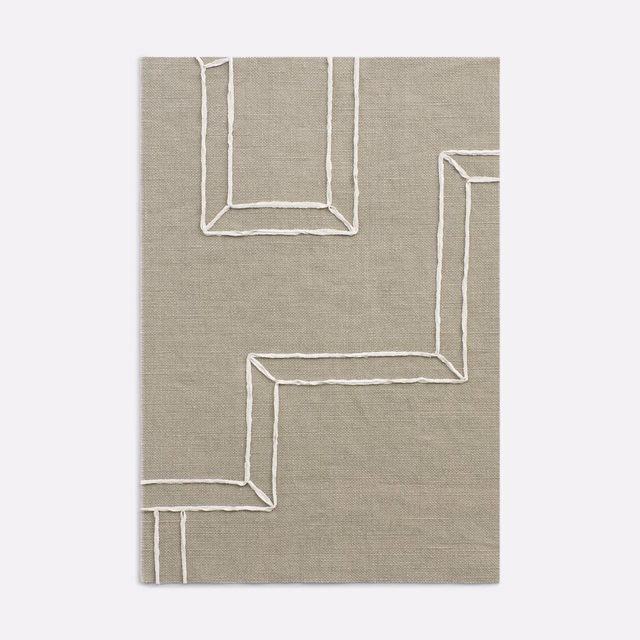 Taupe-grey woven curtain fabric with raised ivory stepped geometric lines