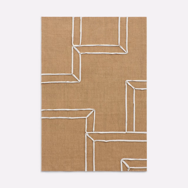 Warm camel woven curtain fabric with cream outlined geometric blocks