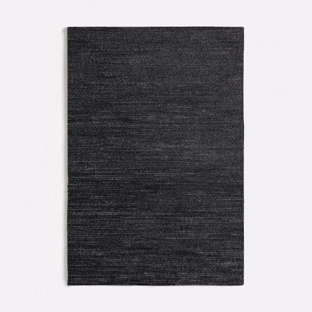 Charcoal dark grey woven swatch with fine horizontal striations and subtle textured variation
