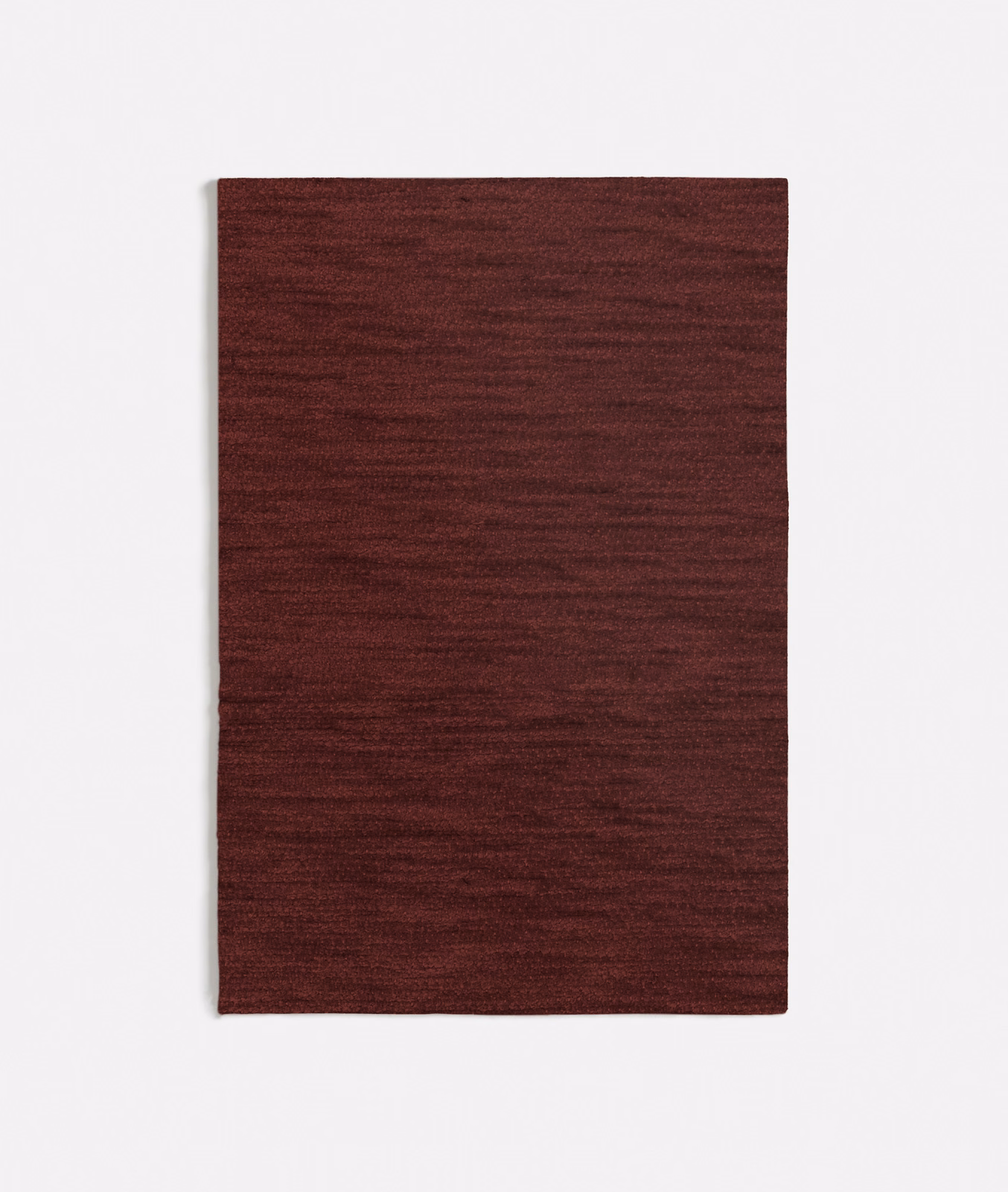 Deep burgundy woven swatch with subtle horizontal texture and low-sheen finish
