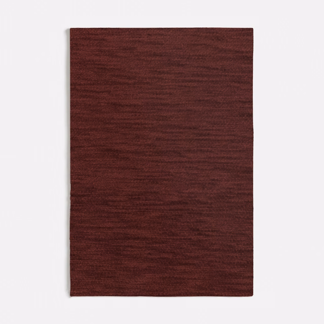 Deep burgundy woven swatch with subtle horizontal texture and low-sheen finish