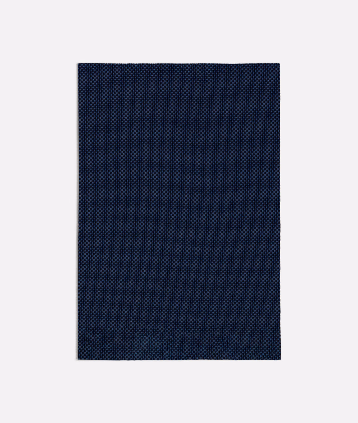 Deep navy Acero Blue swatch with a tiny, evenly textured woven surface