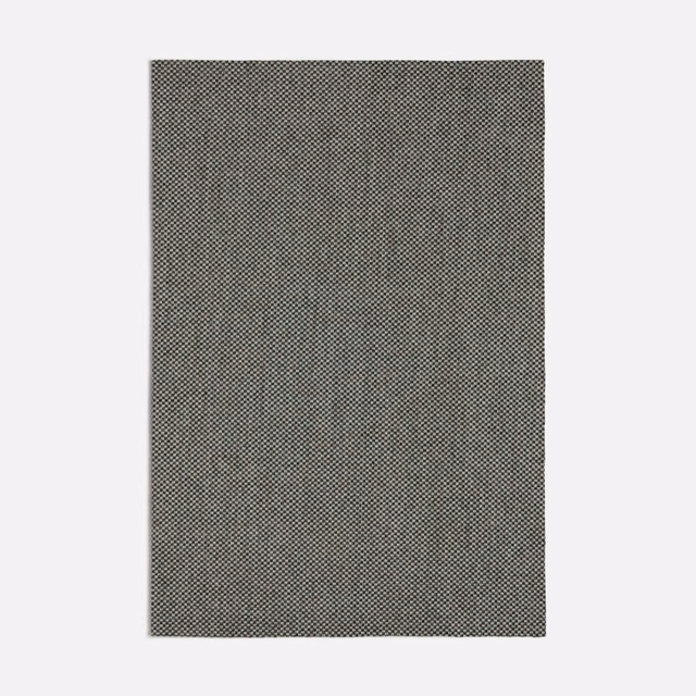 Deep charcoal-grey swatch with a tightly packed black-and-grey micro-check weave