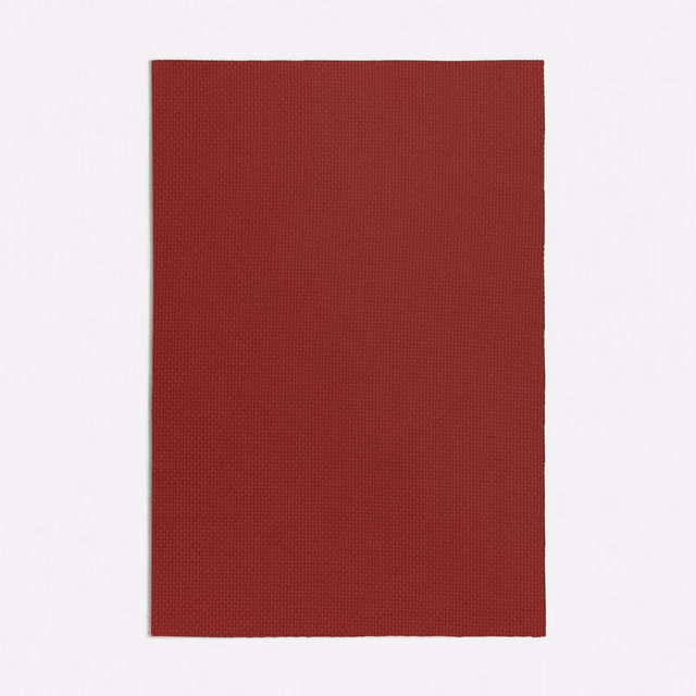 Deep muted red textile with a fine, tightly woven micro-grid texture
