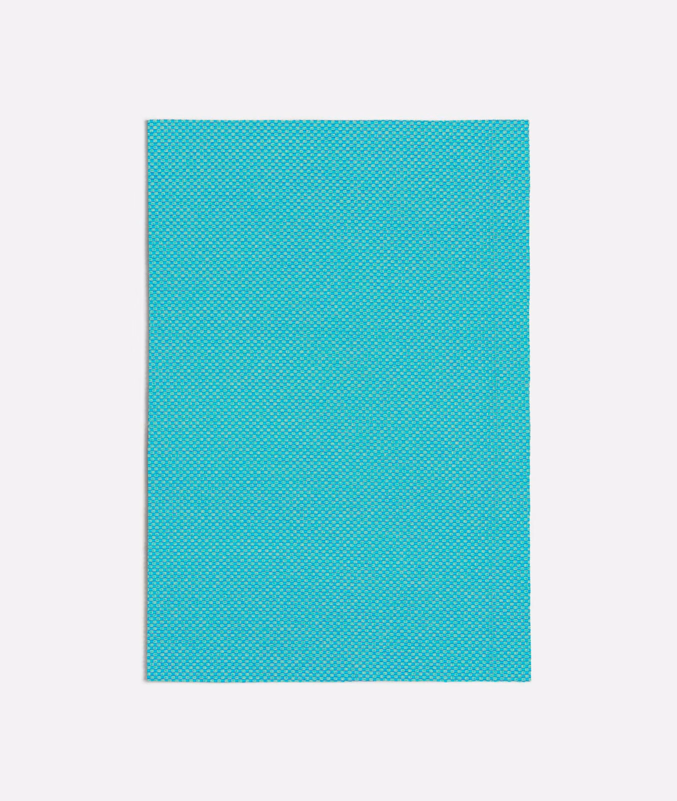 Vivid turquoise woven textile with a tiny, evenly repeated geometric micro-pattern