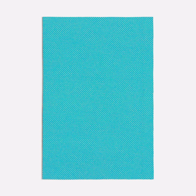 Vivid turquoise woven textile with a tiny, evenly repeated geometric micro-pattern