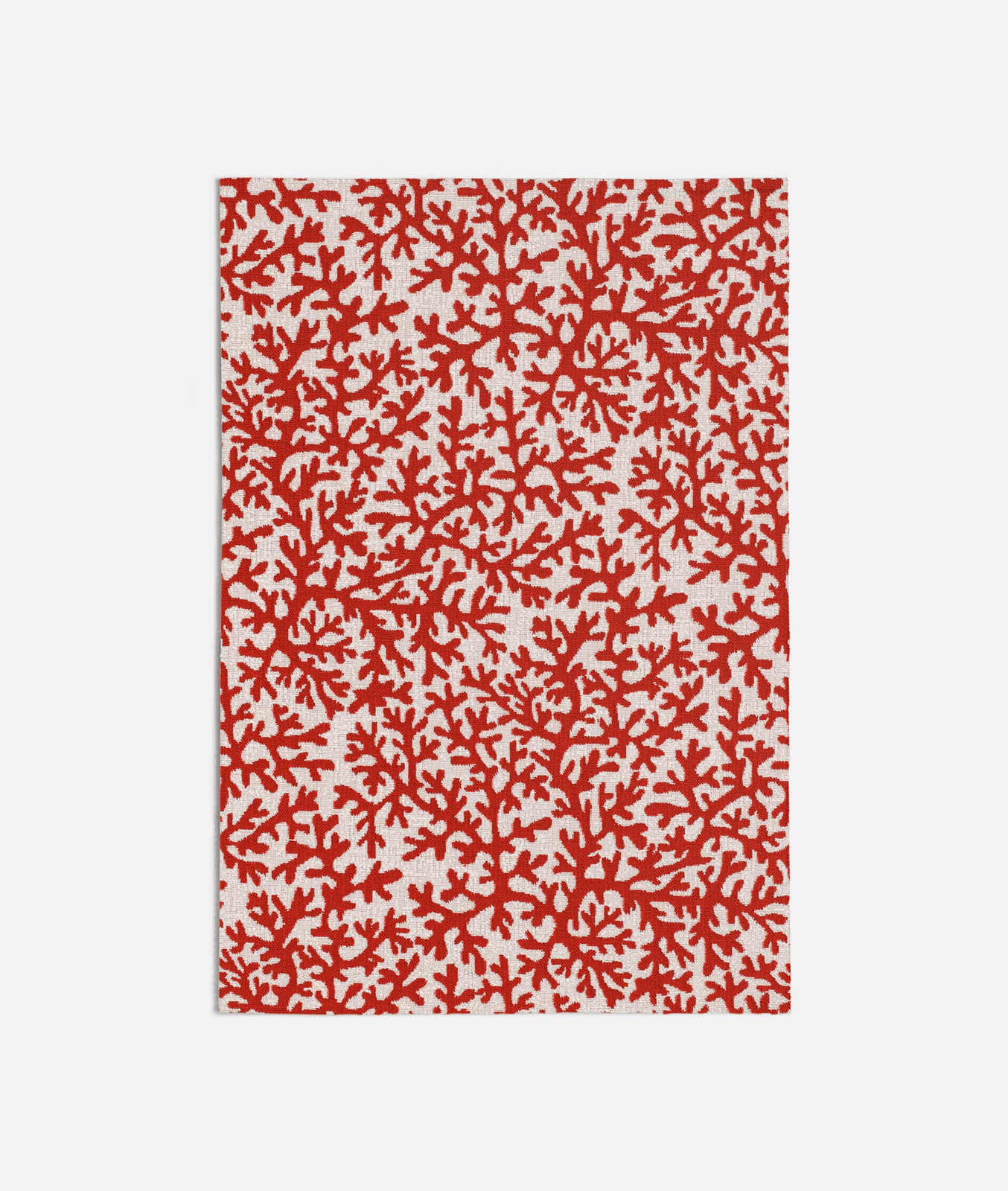 Dense deep red coral branches scattered across a pale ivory fabric ground