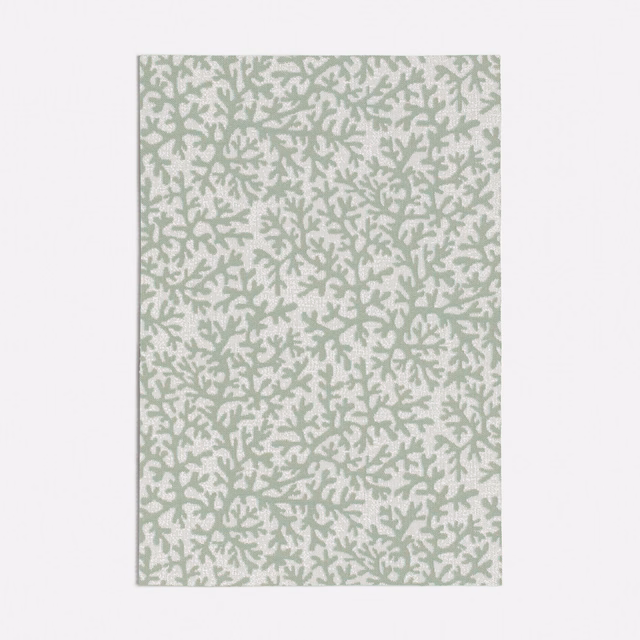 Pale sage textile with dense chalky branching coral-like motifs and soft woven texture