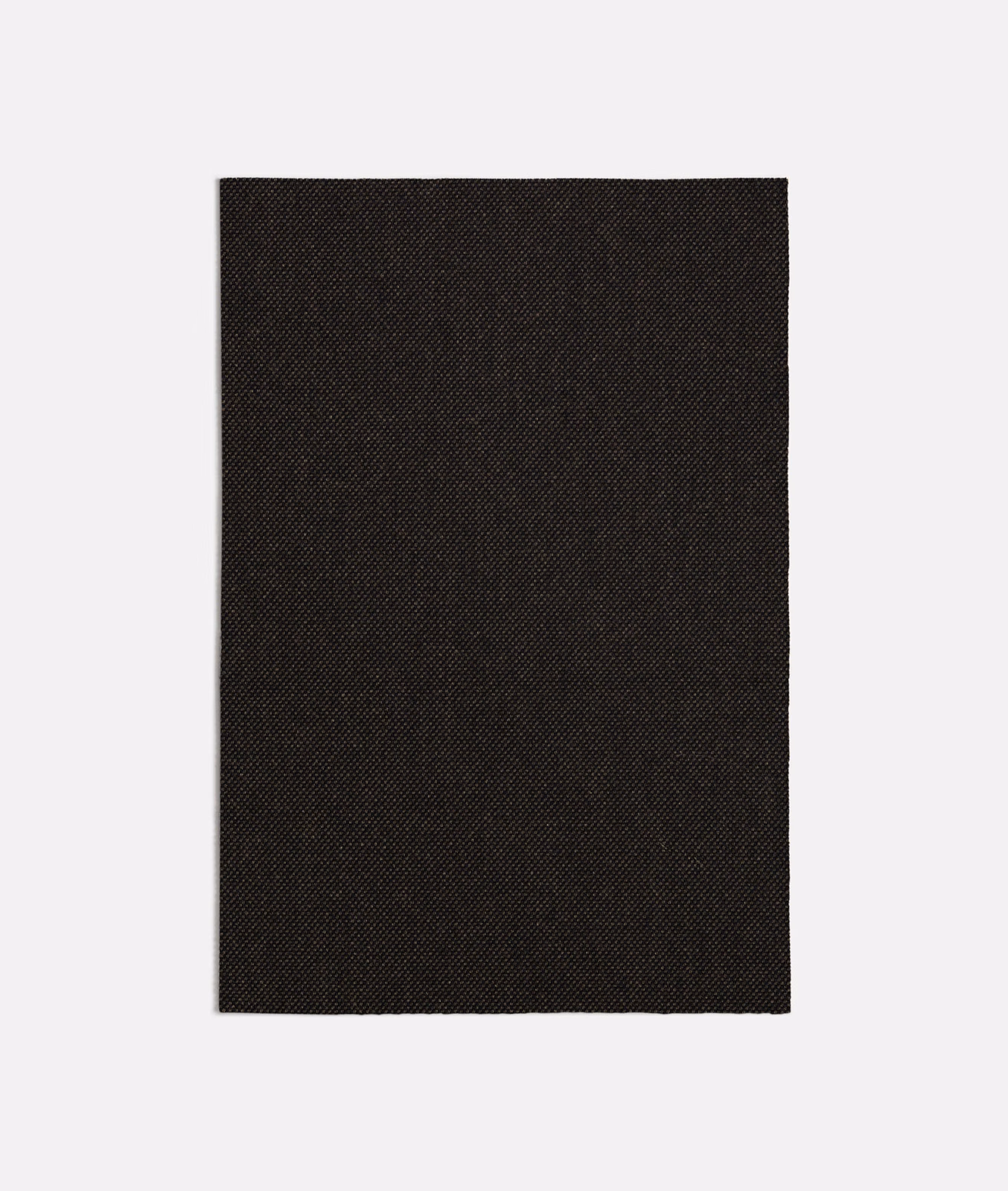 Deep Apache Brown woven textile with fine diagonal grain and near-black chocolate tone