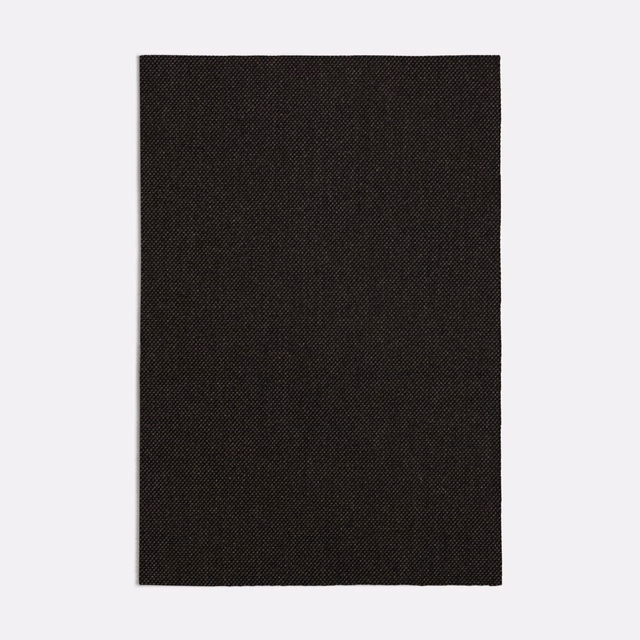 Deep Apache Brown woven textile with fine diagonal grain and near-black chocolate tone