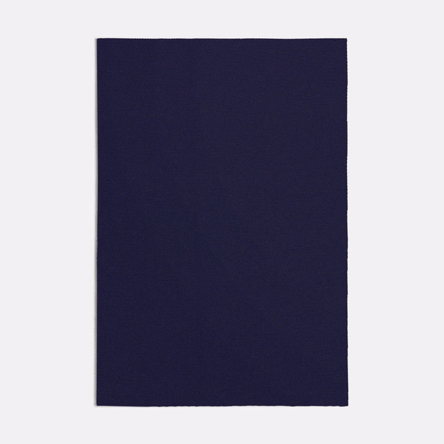 Deep ink-navy fabric swatch showing a fine, subtly diagonal woven texture