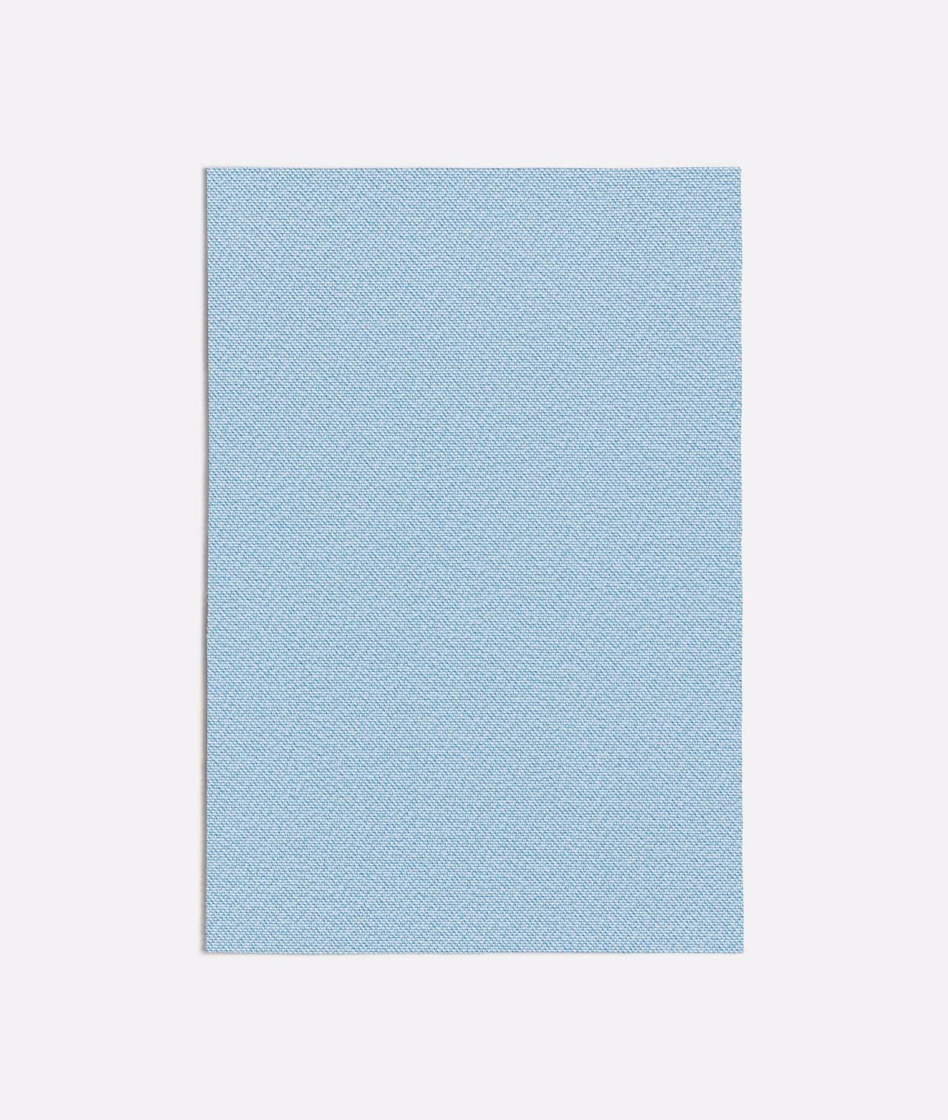 Cool powder-blue textile swatch with a fine diagonal woven texture