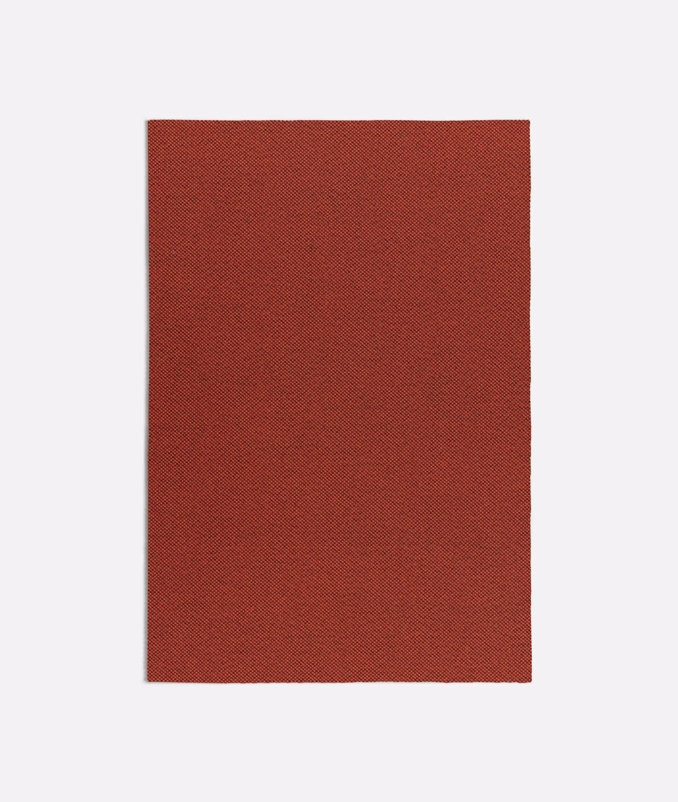 Deep brick-orange fabric swatch with a fine, subtly diagonal woven texture
