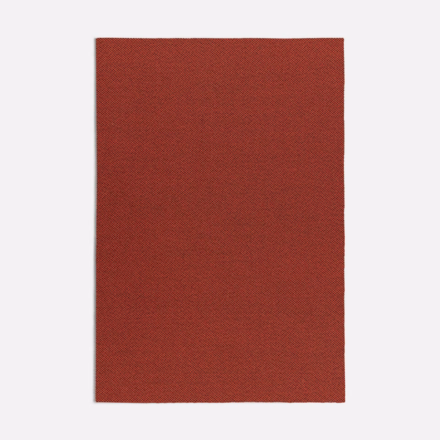 Deep brick-orange fabric swatch with a fine, subtly diagonal woven texture